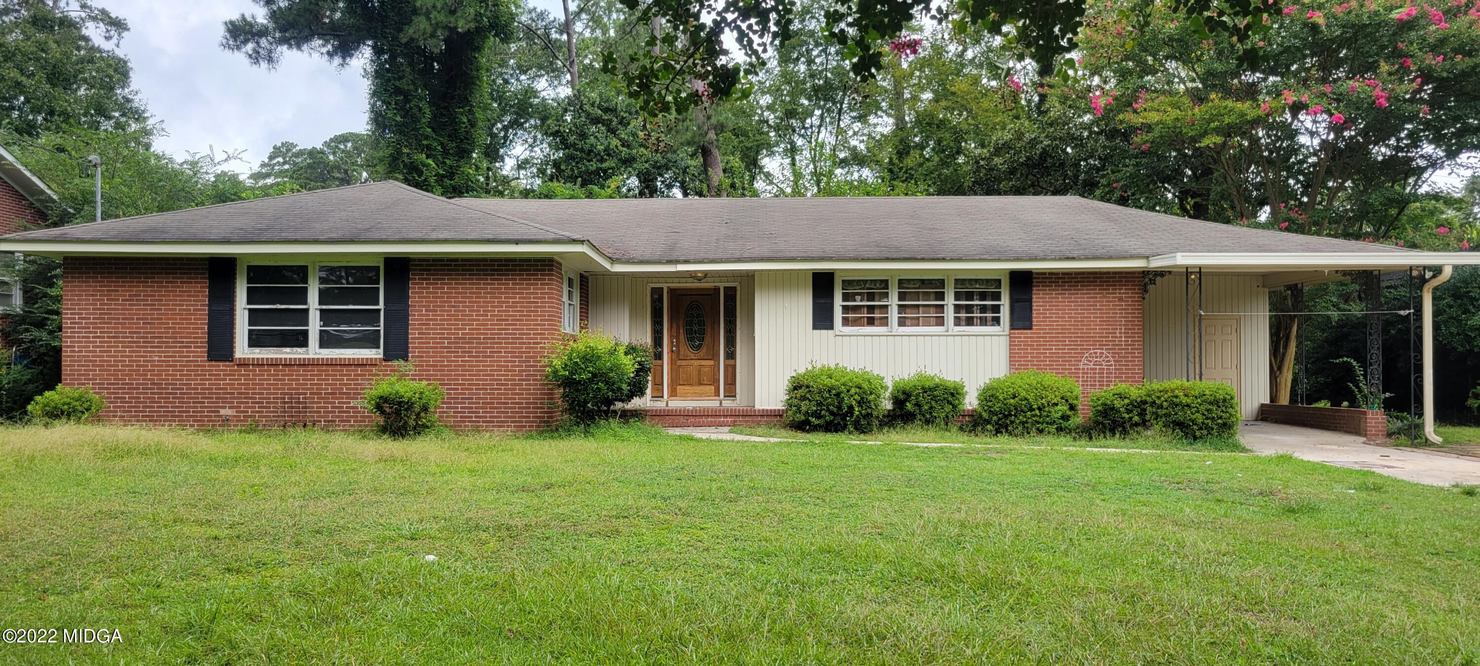 770 Forest Ridge Drive West Macon, GA 31204 - Photo 2 of 2 a front view of house with yard and green space