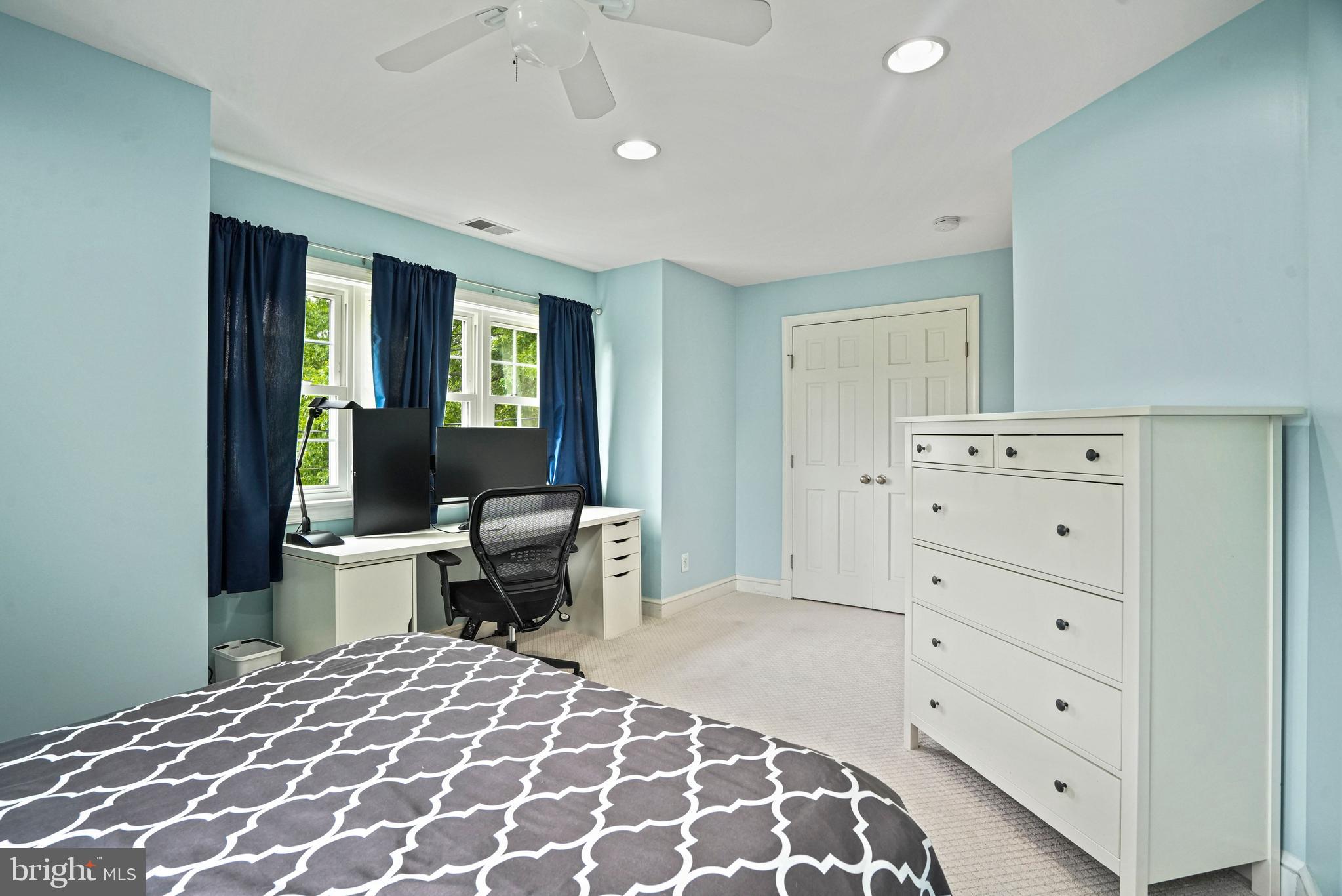1907 Brisbane Street Silver Spring, MD 20902 - Photo 27 of 39 a bedroom with a bed and wooden floor