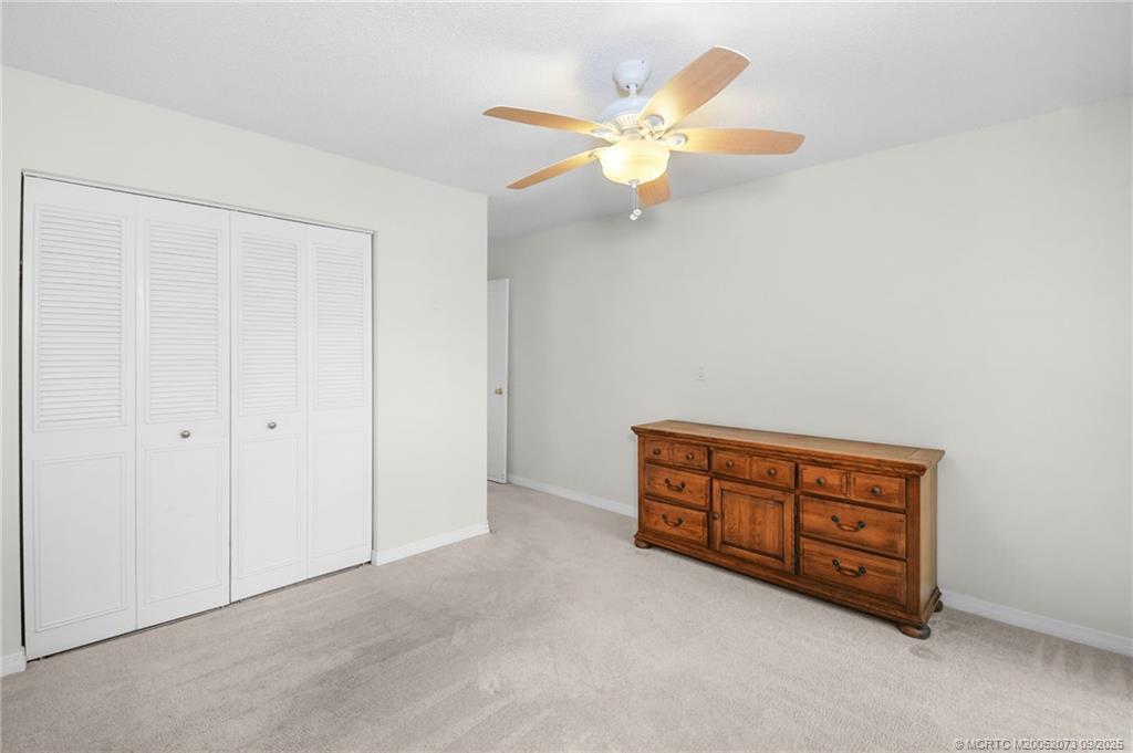 2929 Southeast Ocean Boulevard, Unit 1294 Stuart, FL 34996 - Photo 19 of 30 an empty room with windows