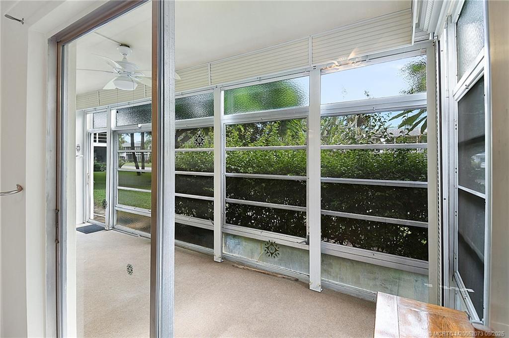 2929 Southeast Ocean Boulevard, Unit 1294 Stuart, FL 34996 - Photo 20 of 30 a view of a room with a large window