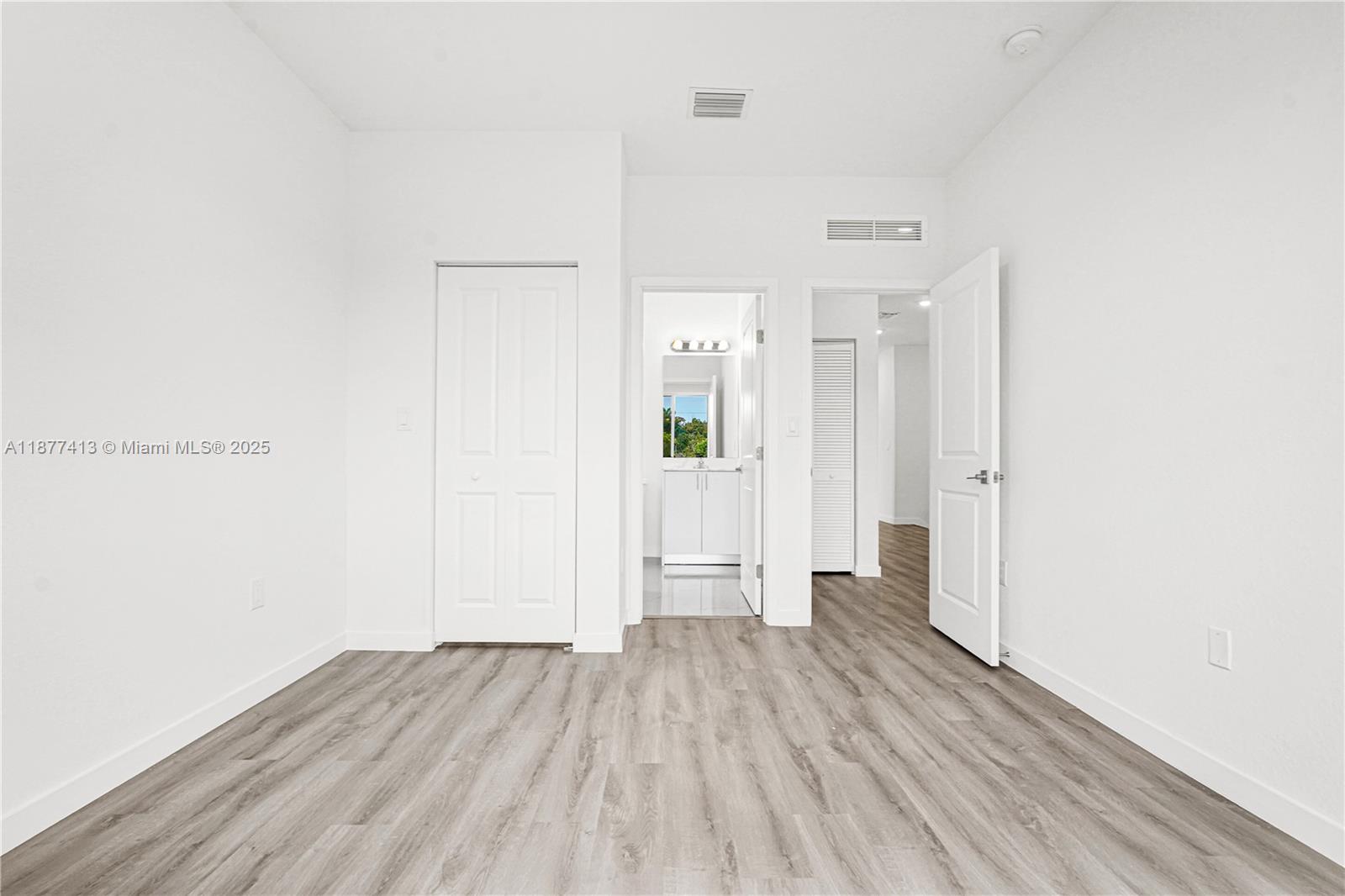 22425 Southwest 125th Avenue, Unit 19A Miami, FL 33170 - Photo 55 of 61 wooden floor in an empty room