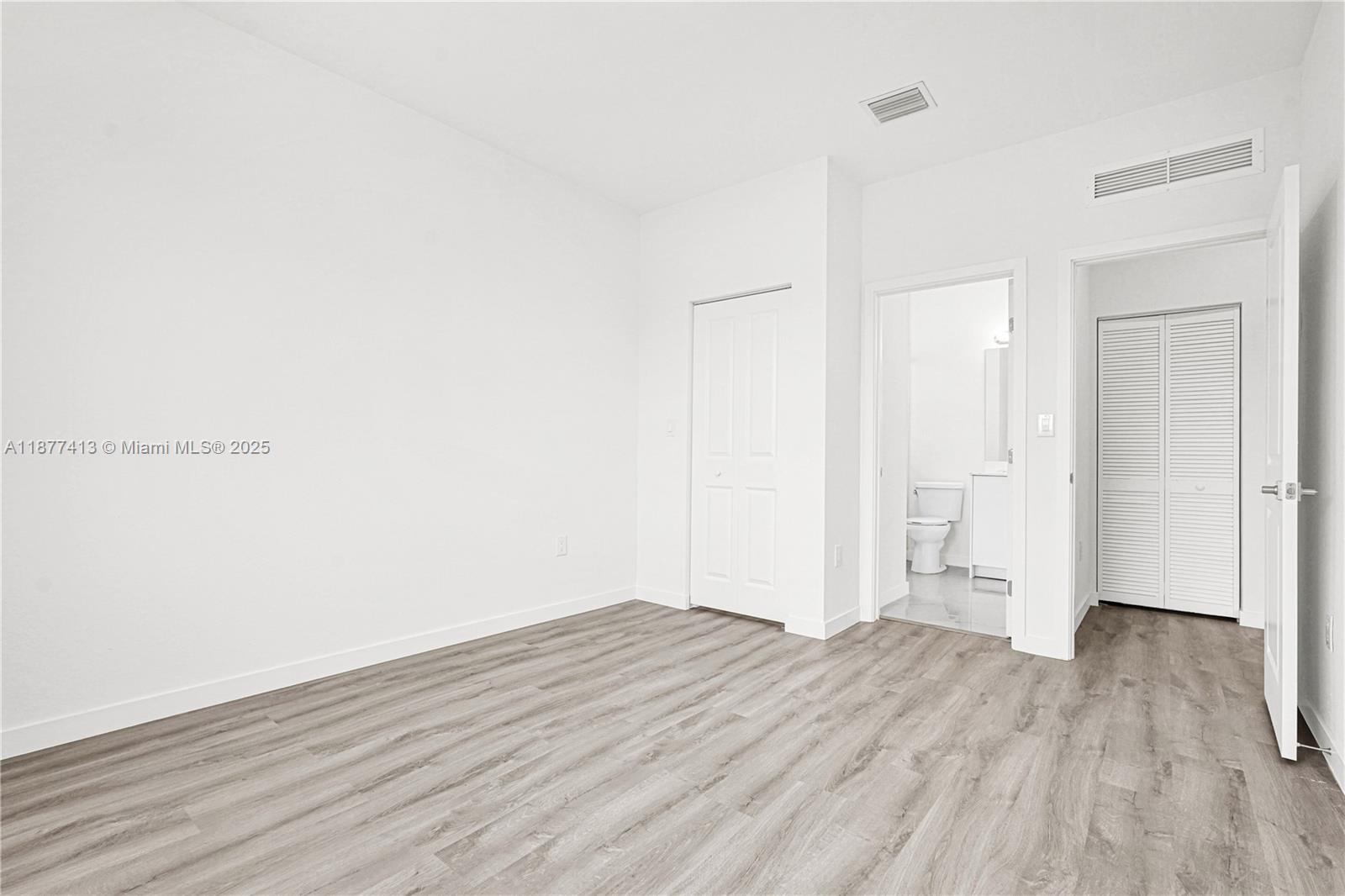 22425 Southwest 125th Avenue, Unit 19A Miami, FL 33170 - Photo 56 of 61 a view of a room with wooden floor