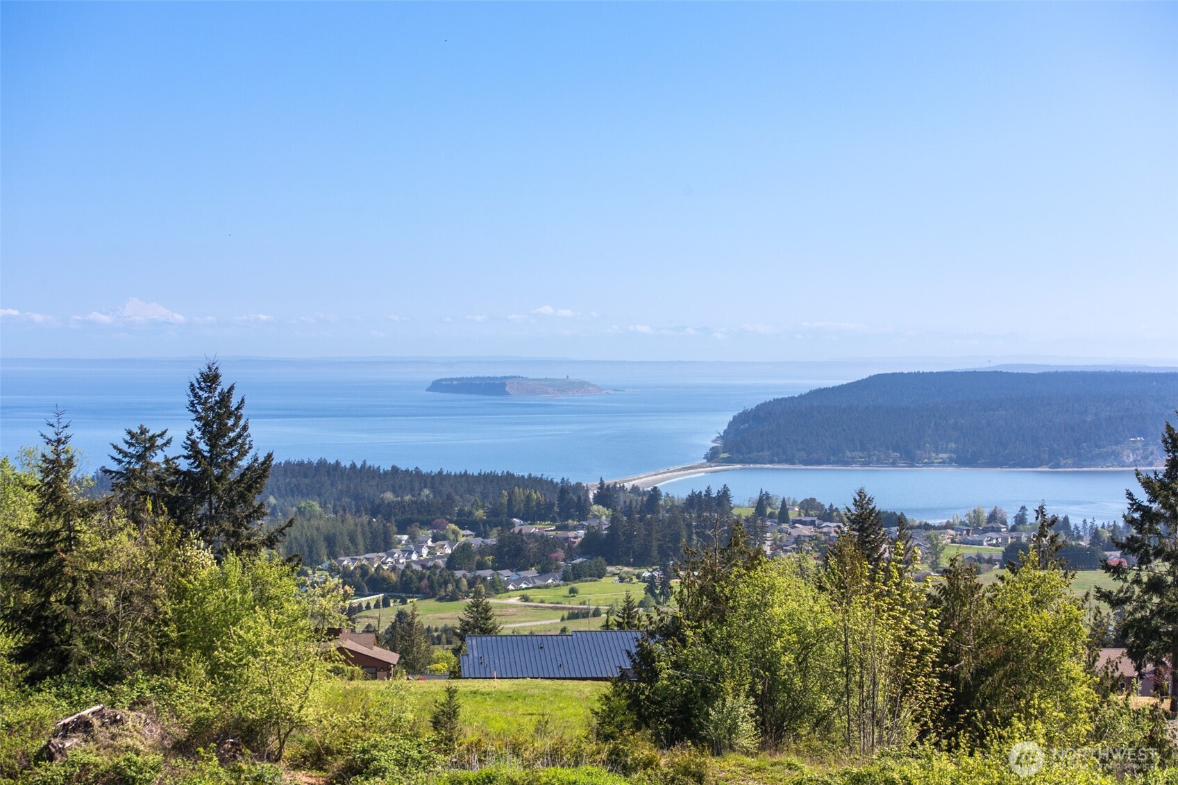 623 Doe Run Road Sequim, WA 98382 - Photo 6 of 13 a view of a city with sunset view