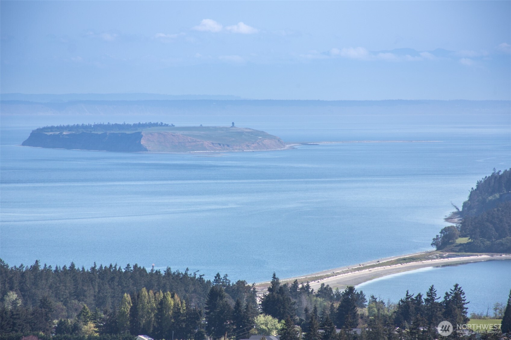 623 Doe Run Road Sequim, WA 98382 - Photo 7 of 13 a view of lake and mountain in the back
