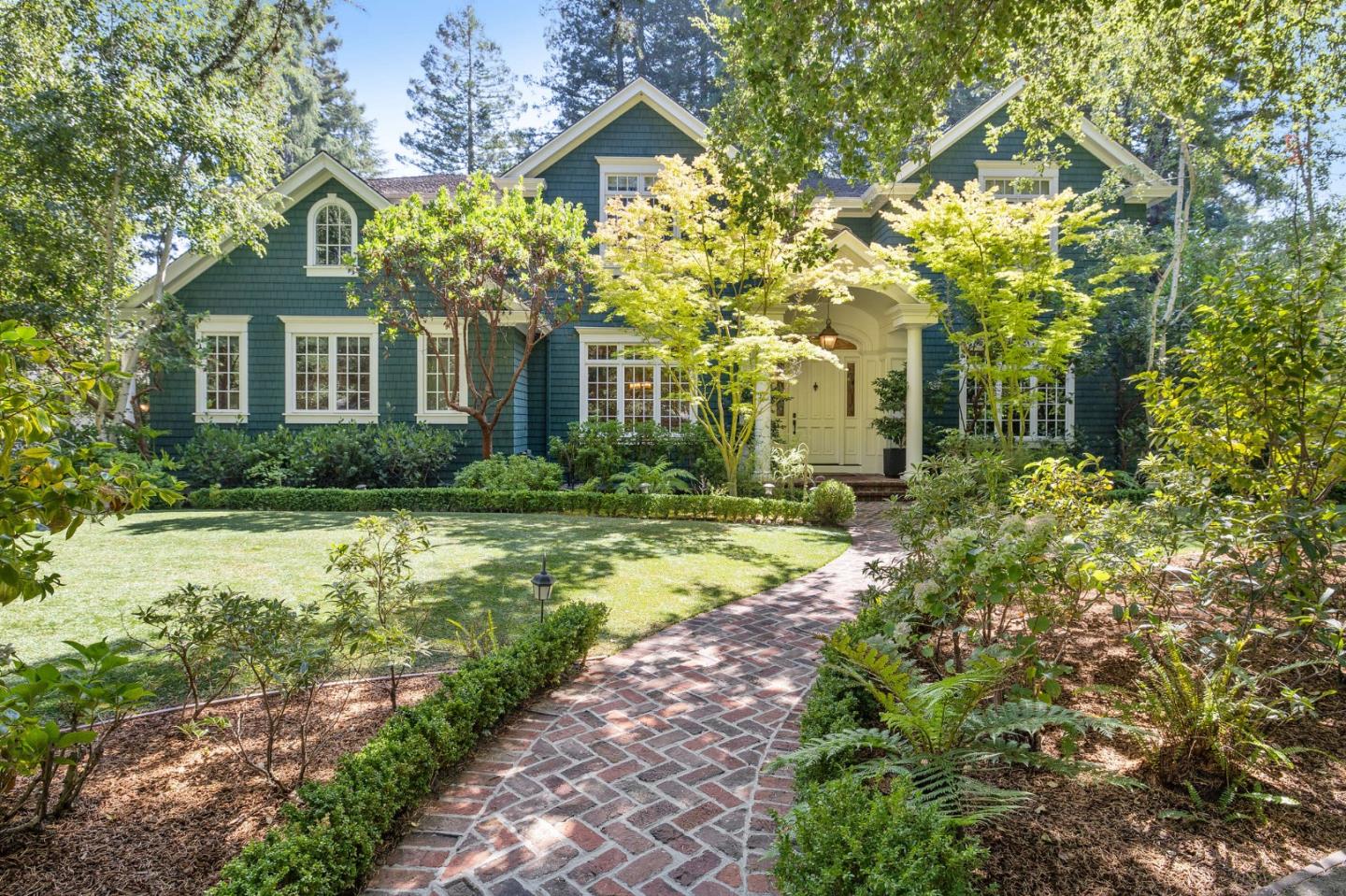 74 Lilac Drive Atherton, CA 94027 - Photo 1 of 81 a front view of a house with garden
