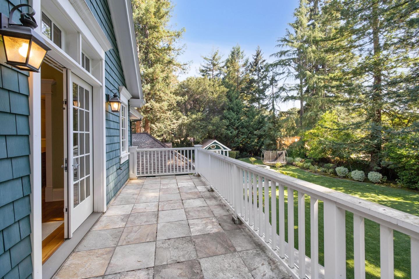 74 Lilac Drive Atherton, CA 94027 - Photo 36 of 81 a view of a balcony with a tree