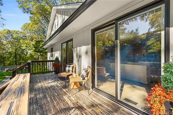 a building view with outdoor seating space