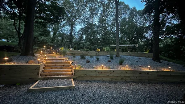 a view of outdoor space with deck and yard