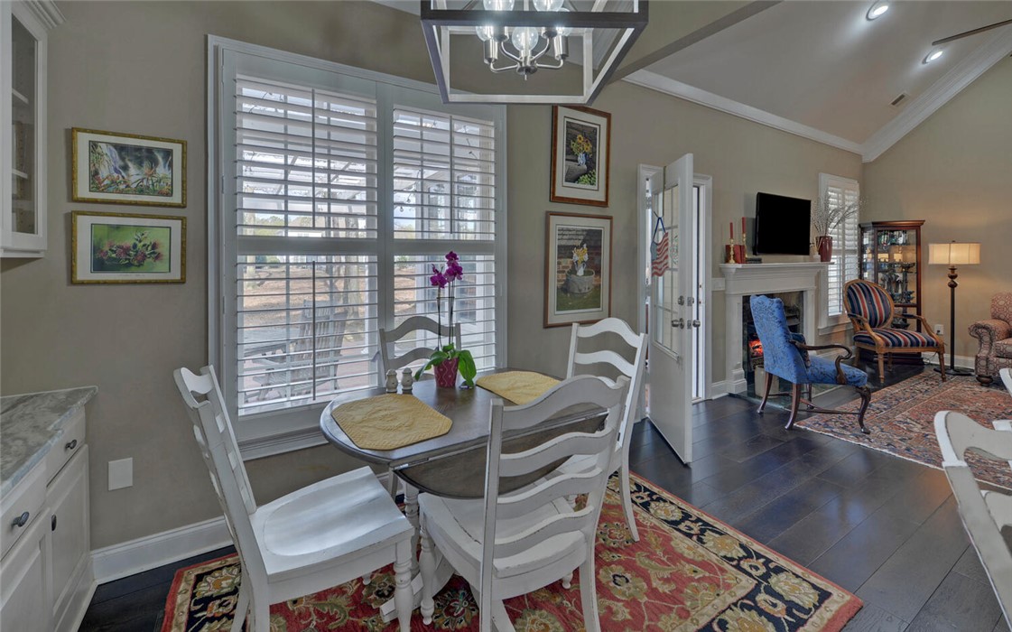 39 Azalea Drive Hartwell, GA 30643 - Photo 12 of 45 This inviting space features a dining area that seamlessly transitions into a comfortable living room.