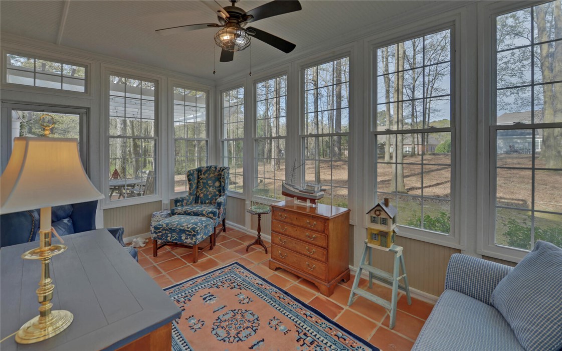 39 Azalea Drive Hartwell, GA 30643 - Photo 16 of 45 This bright sunroom with expansive windows offers a serene escape with beautiful outdoor views.