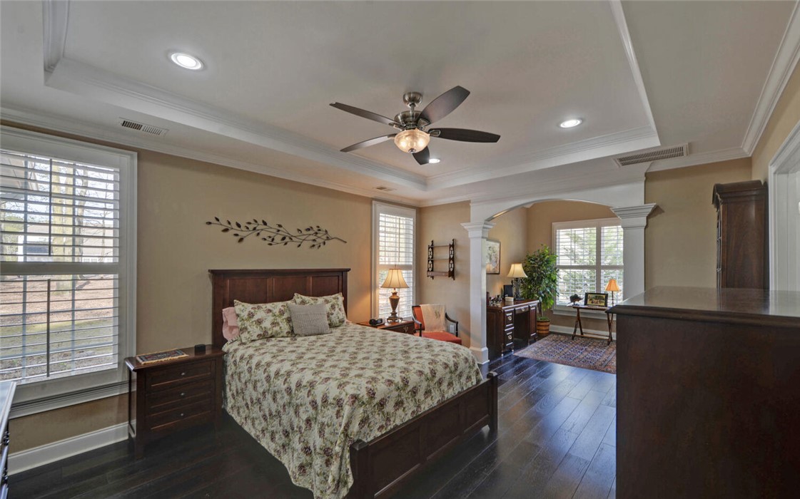 39 Azalea Drive Hartwell, GA 30643 - Photo 18 of 45 This spacious bedroom offers ample light and a dedicated work area, perfect for comfort and productivity.