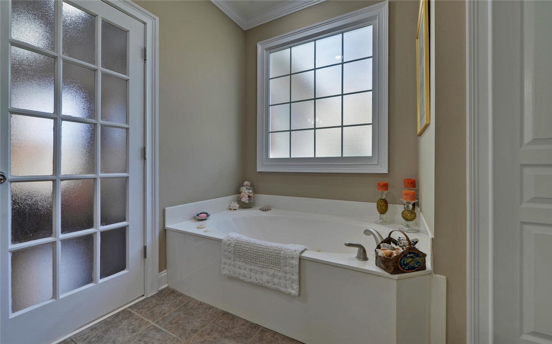 39 Azalea Drive Hartwell, GA 30643 - Photo 23 of 45 This tranquil bathroom features a luxurious soaking tub, perfect for relaxation.