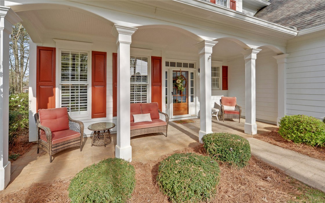 39 Azalea Drive Hartwell, GA 30643 - Photo 3 of 45 This charming front porch welcomes you with classic architectural details and inviting outdoor living space.