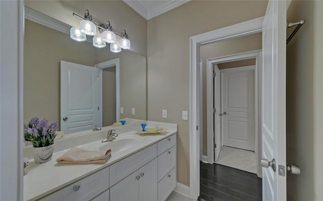 39 Azalea Drive Hartwell, GA 30643 - Photo 32 of 45 This bright bathroom features a spacious vanity and ample lighting, creating a refreshing atmosphere.