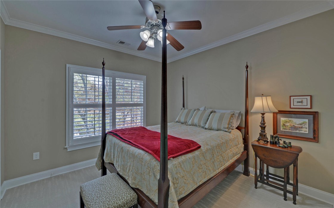 39 Azalea Drive Hartwell, GA 30643 - Photo 34 of 45 This tranquil bedroom offers comfort and a peaceful retreat.