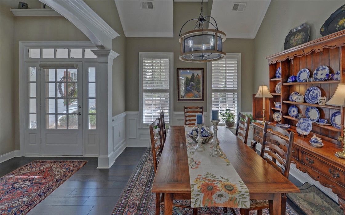 39 Azalea Drive Hartwell, GA 30643 - Photo 6 of 45 This elegant dining room features ample natural light and detailed architectural elements.