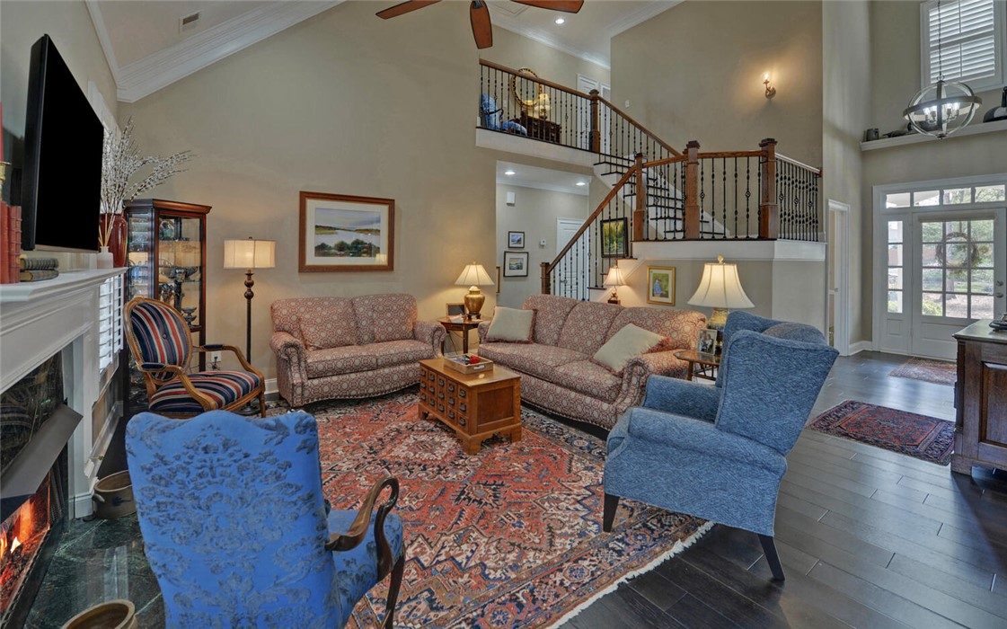 39 Azalea Drive Hartwell, GA 30643 - Photo 8 of 45 This inviting living space features high ceilings and elegant hardwood flooring.