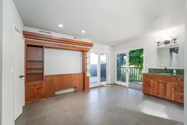 a view of an empty room and window