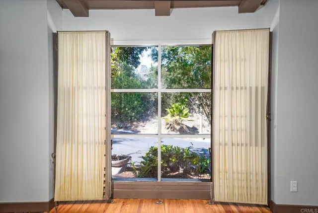 a view of a room and a window