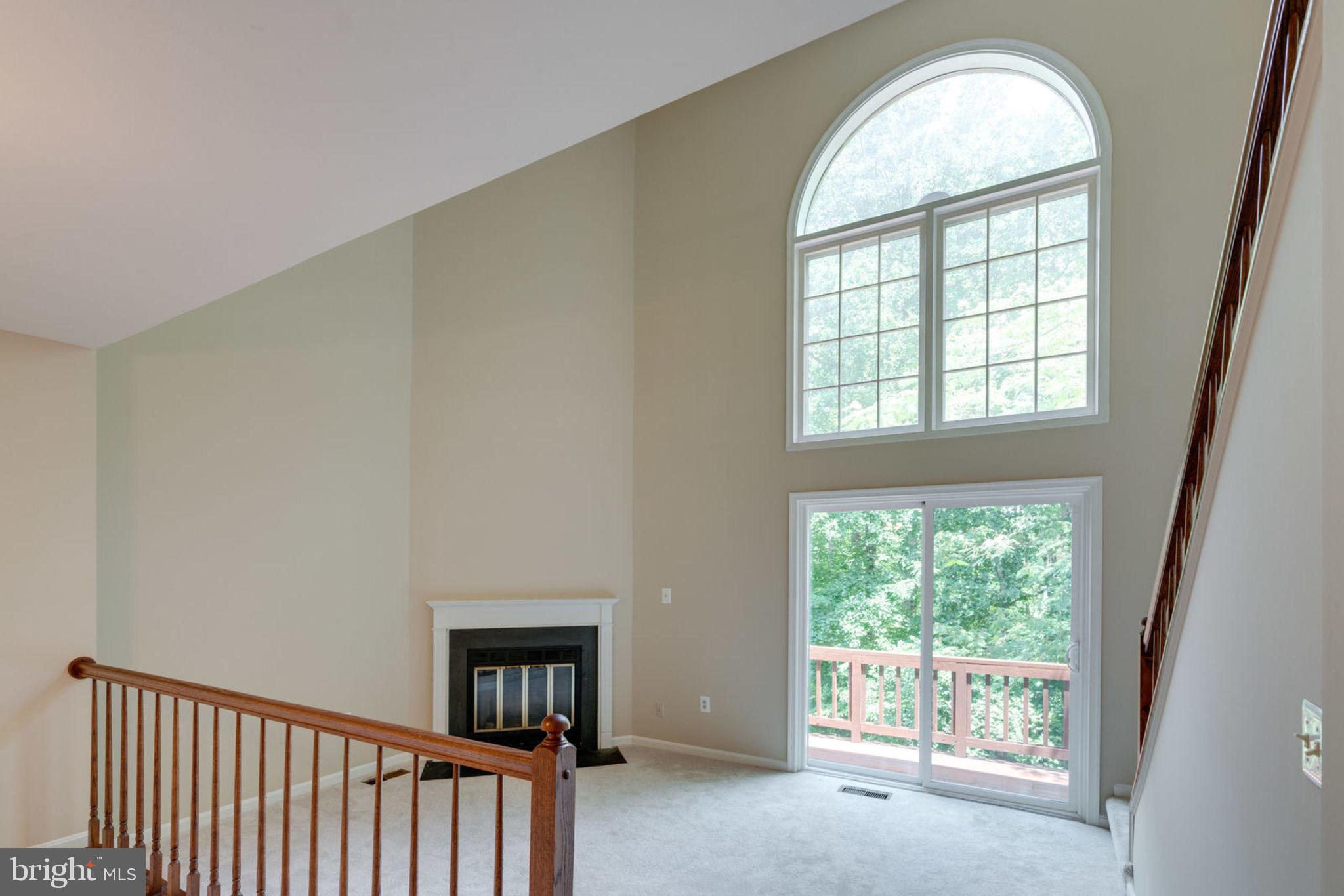 8130 Cliffview Avenue Springfield, VA 22153 - Photo 2 of 50 Living room with glass doors to balcony