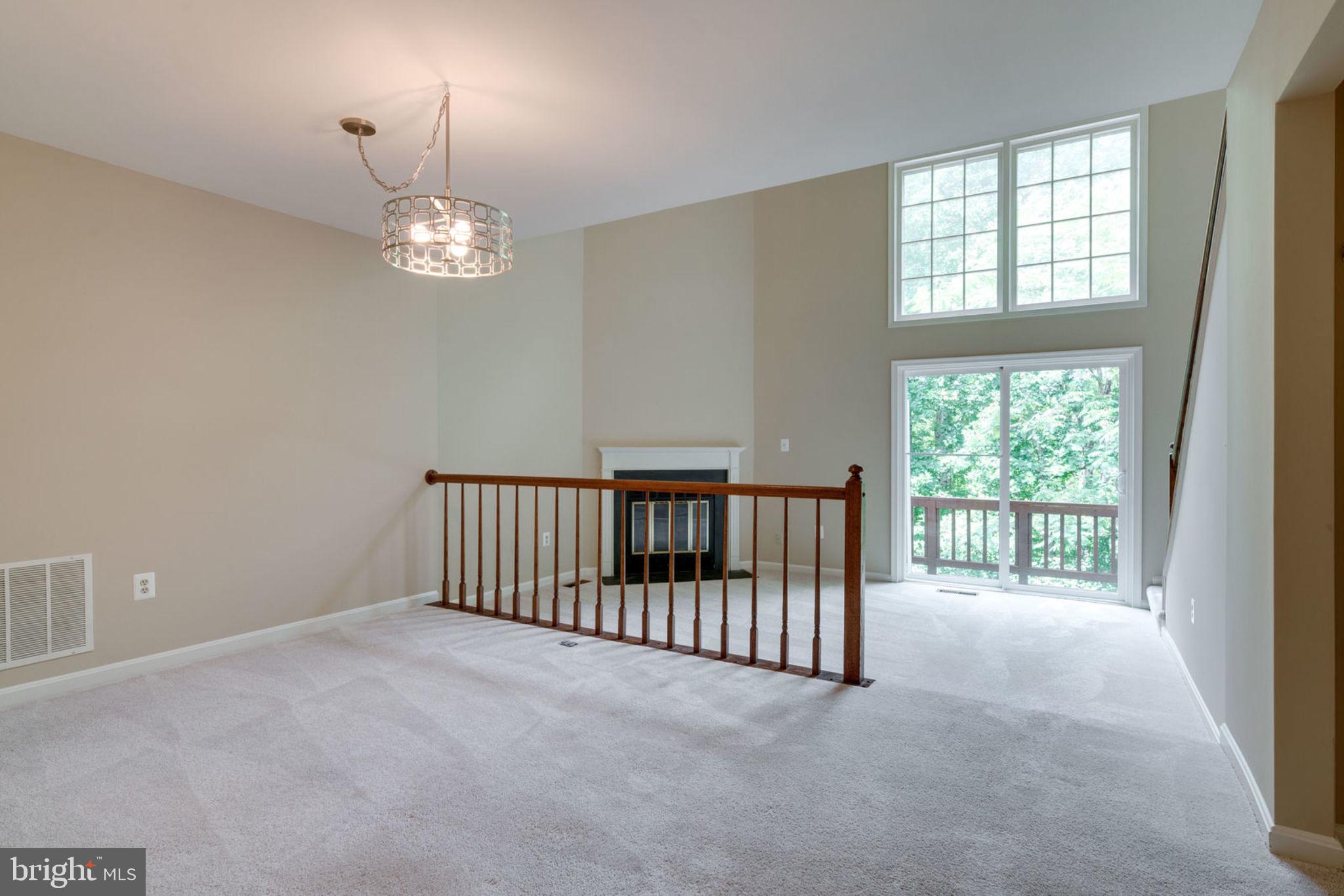 8130 Cliffview Avenue Springfield, VA 22153 - Photo 14 of 50 Dining room and sunken living room