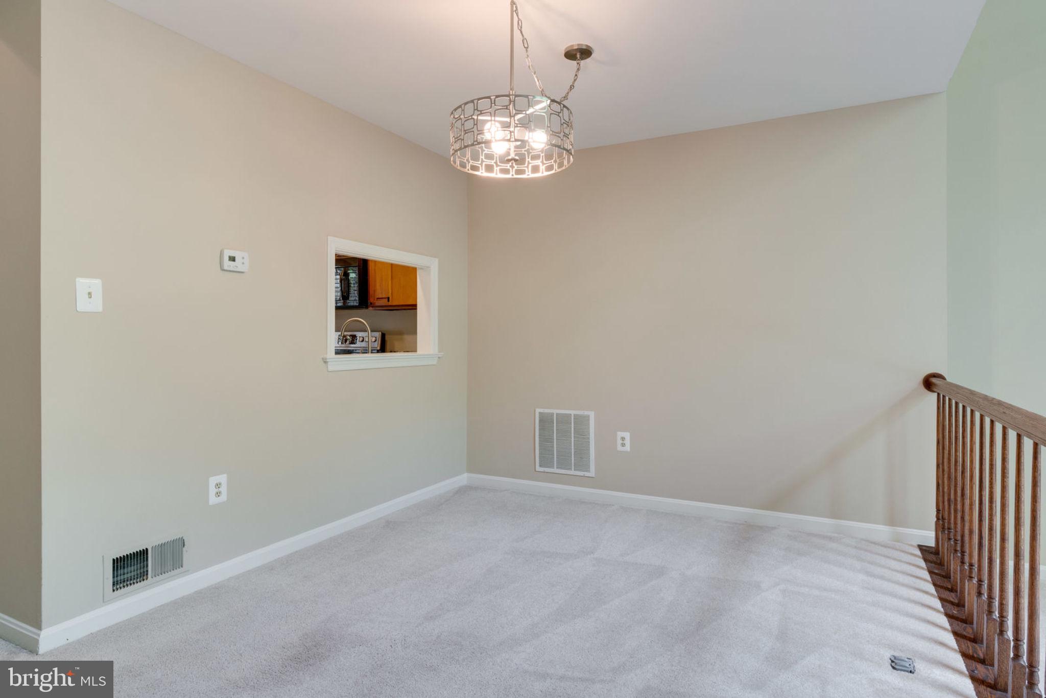8130 Cliffview Avenue Springfield, VA 22153 - Photo 15 of 50 Dining area with pass-through to kitchen (left)