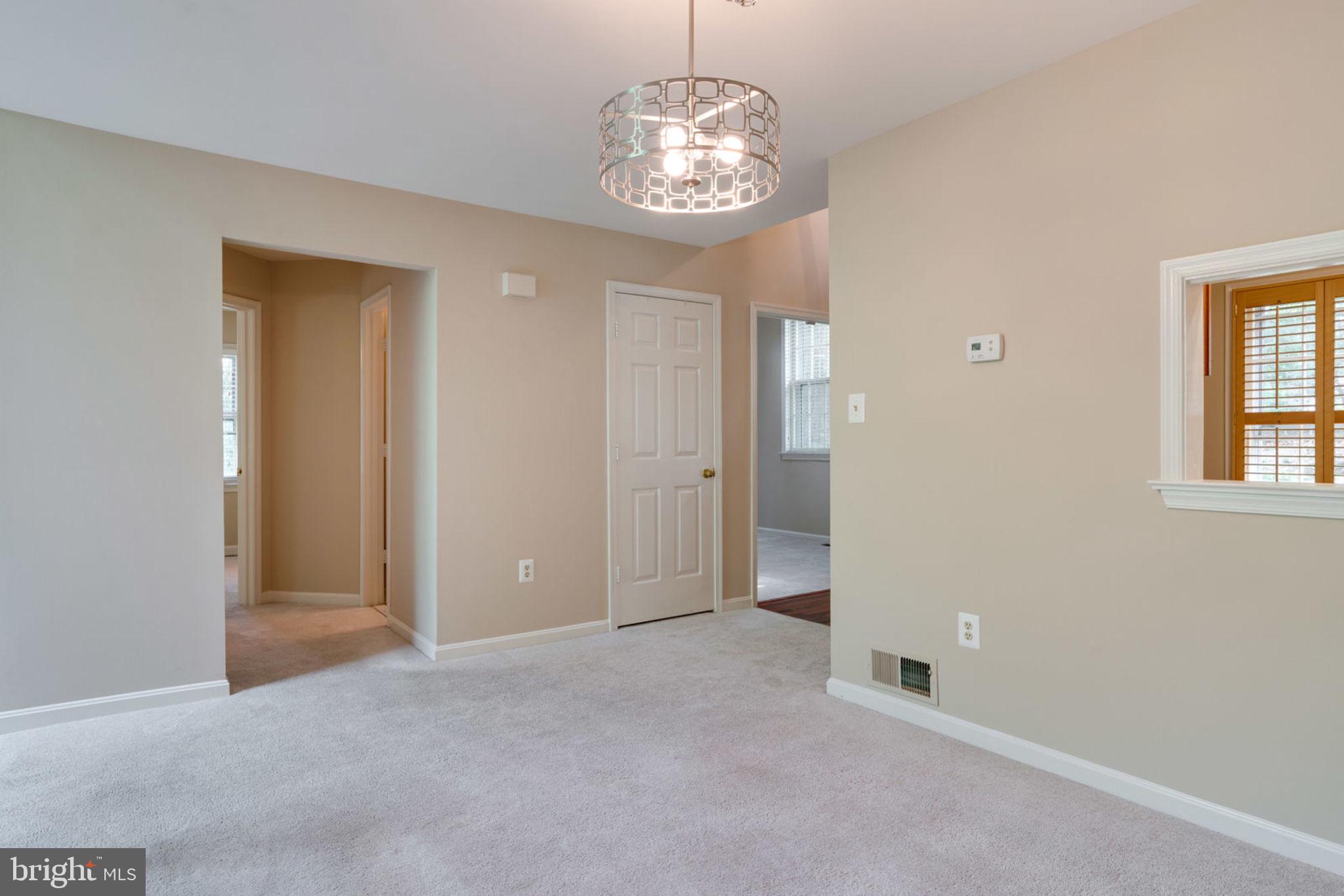 8130 Cliffview Avenue Springfield, VA 22153 - Photo 16 of 50 Small hallway to main level master off dining
