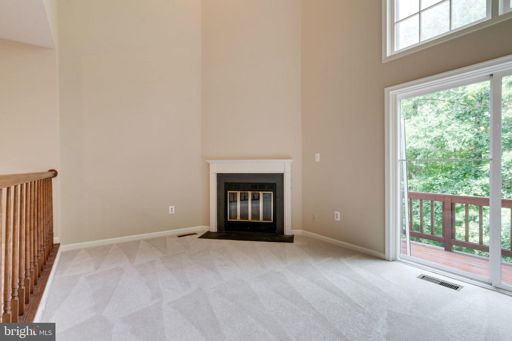 8130 Cliffview Avenue Springfield, VA 22153 - Photo 18 of 50 Sunken living room with 2 story ceilings