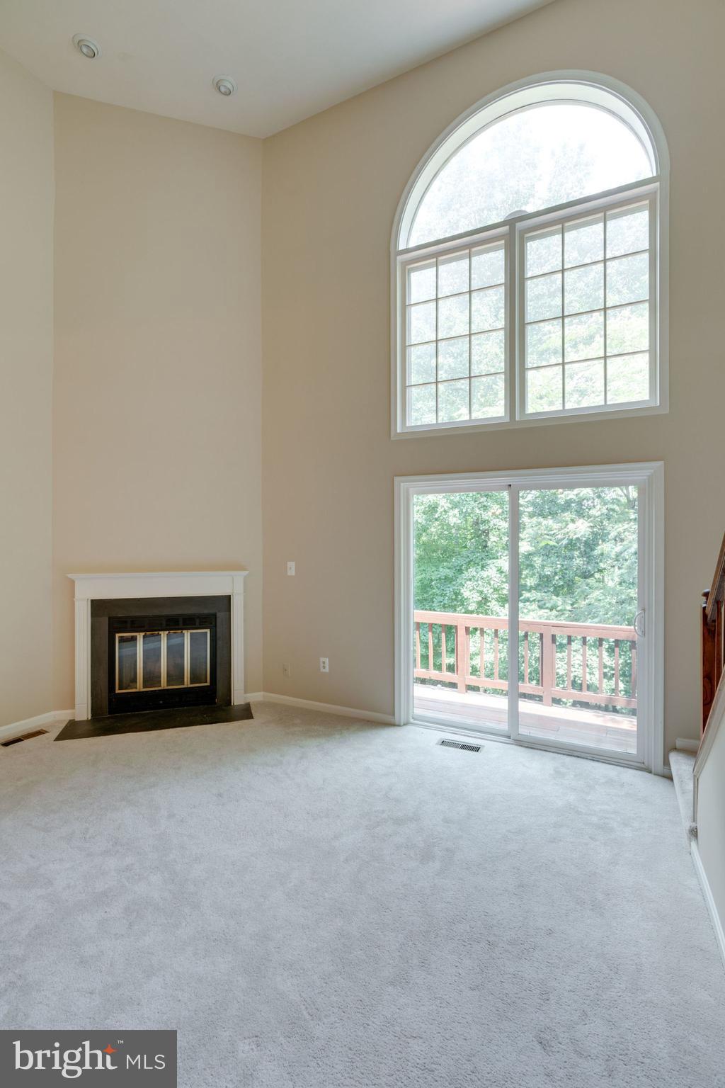 8130 Cliffview Avenue Springfield, VA 22153 - Photo 20 of 50 Living room with glass doors to balcony