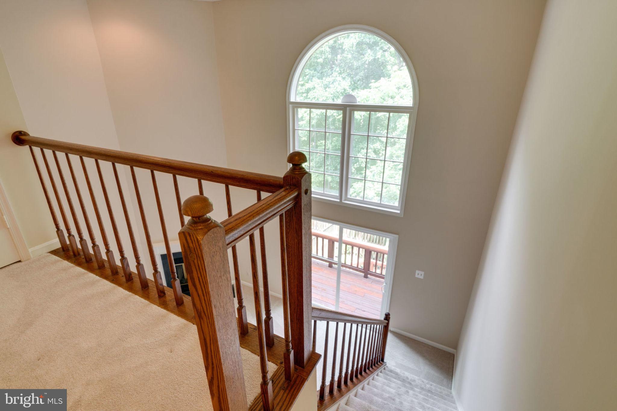 8130 Cliffview Avenue Springfield, VA 22153 - Photo 28 of 50 View down stairs to living room, balcony