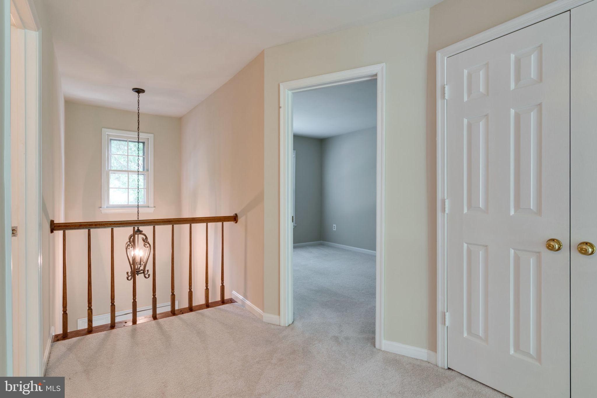 8130 Cliffview Avenue Springfield, VA 22153 - Photo 29 of 50 Upstairs hallway overlooking entryway