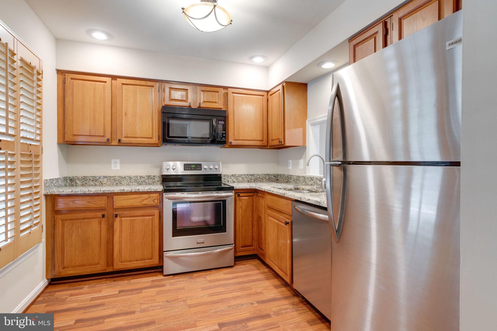 8130 Cliffview Avenue Springfield, VA 22153 - Photo 10 of 50 Kitchen located at front entry, granite/stainless