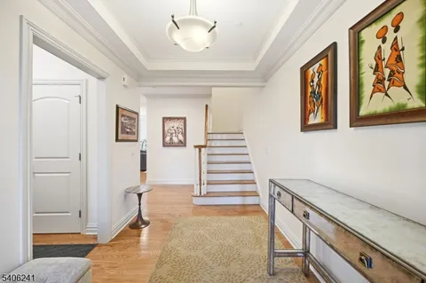 a view of a hallway with staircase