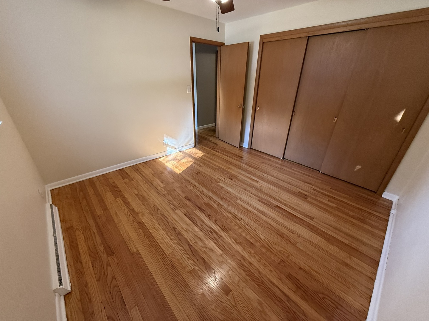 5209 12th Avenue Moline, IL 61265 - Photo 18 of 33 a view of empty room with wooden floor