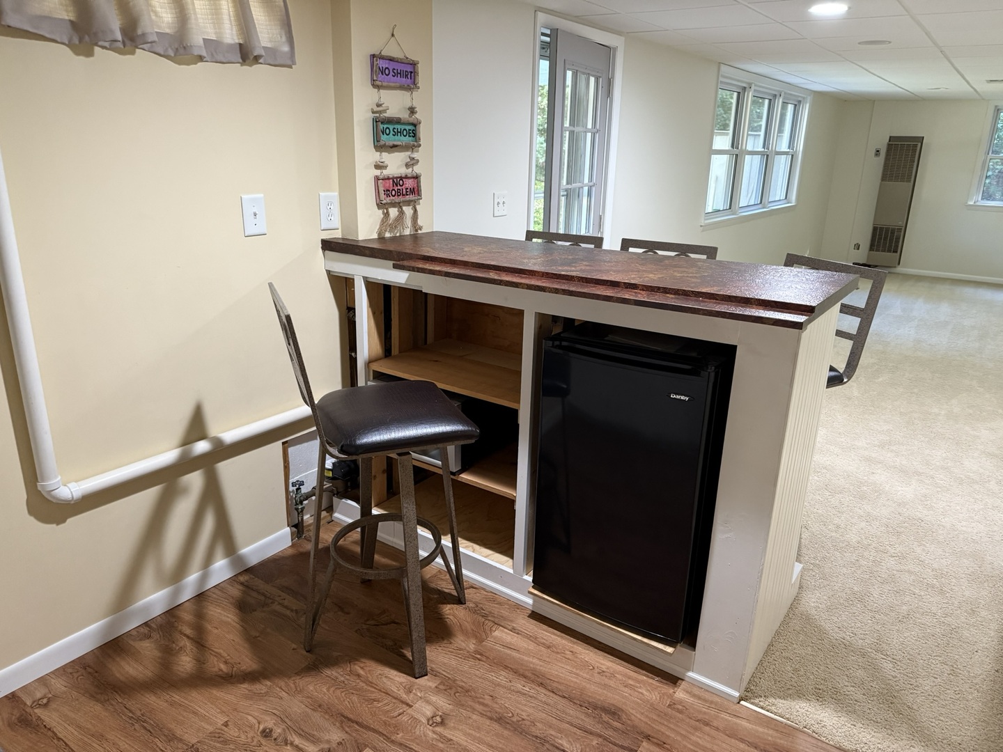 5209 12th Avenue Moline, IL 61265 - Photo 25 of 33 a view of a hallway with furniture and wooden floor