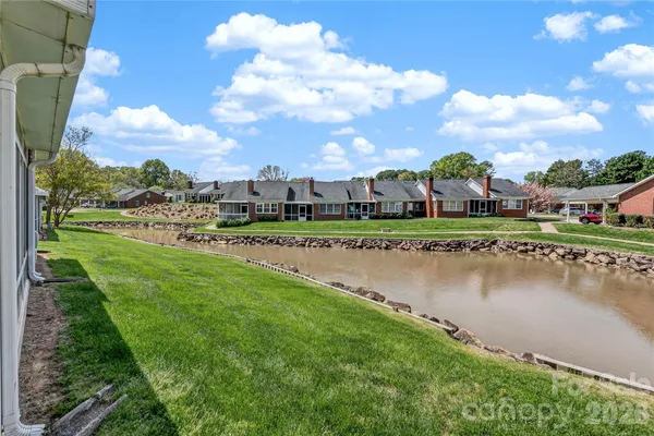 a view of a lake with a city