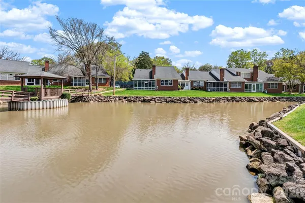 a view of a lake with houses