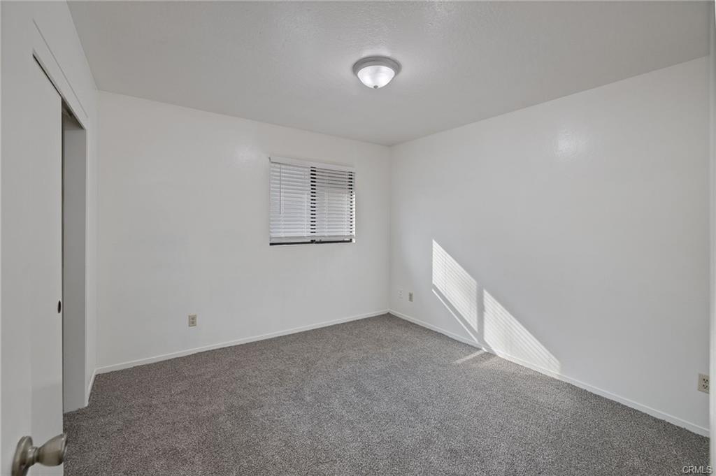 49400 River Park Road, Unit 17 Oakhurst, CA 93644 - Photo 12 of 34 a view of an empty room with a window