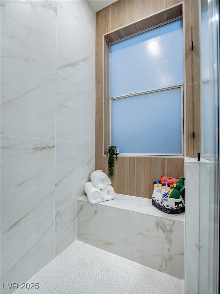7870 Midnight Ride Street Las Vegas, NV 89131 - Photo 52 of 69 Bathroom featuring a tile shower