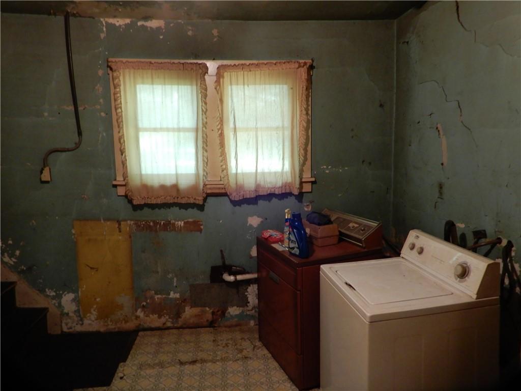 1185 Franklin Road Jackson Center, PA 16133 - Photo 11 of 16 a bathroom with a sink and a toilet