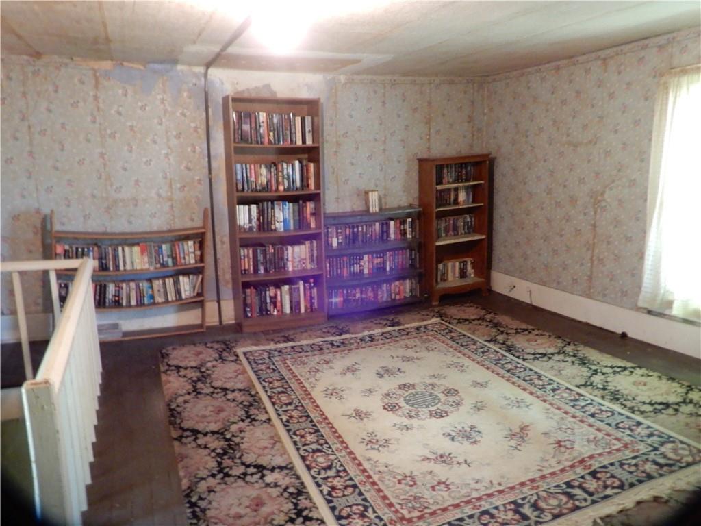 1185 Franklin Road Jackson Center, PA 16133 - Photo 12 of 16 a view of a bedroom with furniture and window