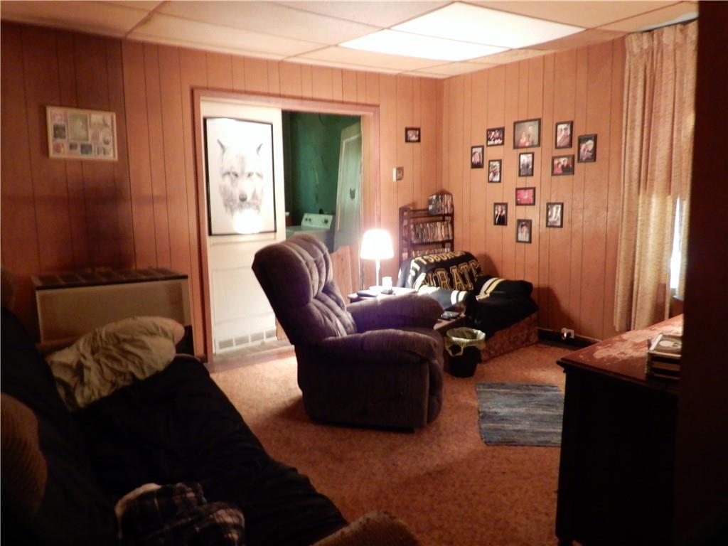 1185 Franklin Road Jackson Center, PA 16133 - Photo 10 of 16 a living room with furniture and a window