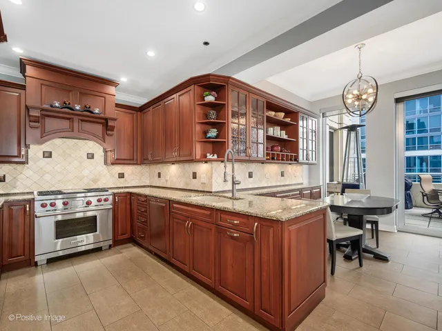 a kitchen with a stove and a sink