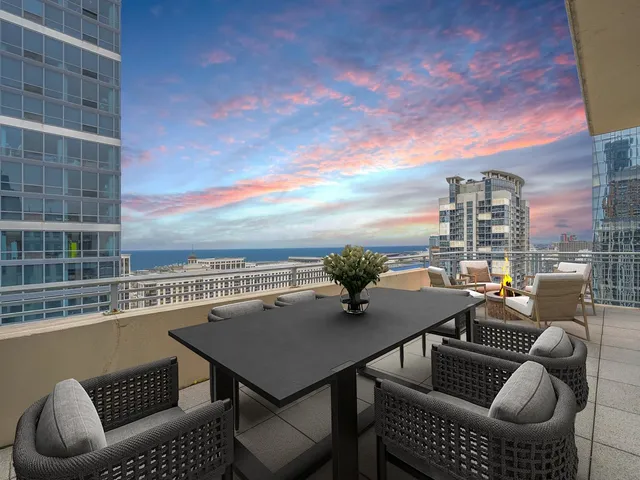 a terrace of a house with outdoor seating
