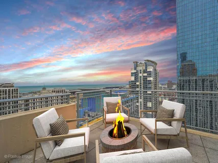 a view of a chairs and table in the terrace