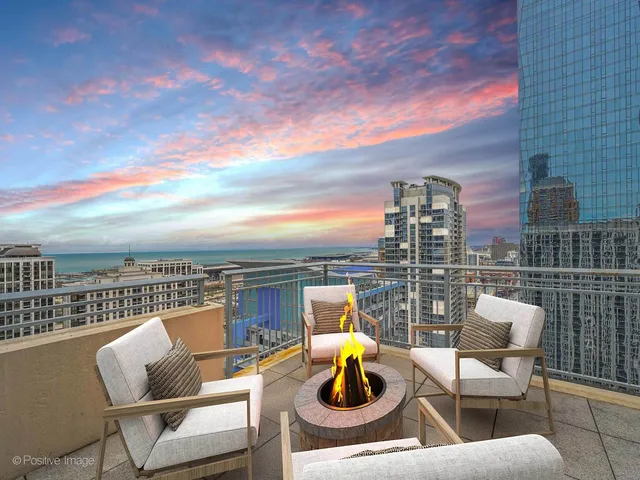 a view of a chairs and table in the terrace