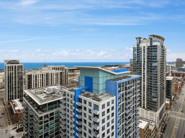 a view of a city with tall buildings