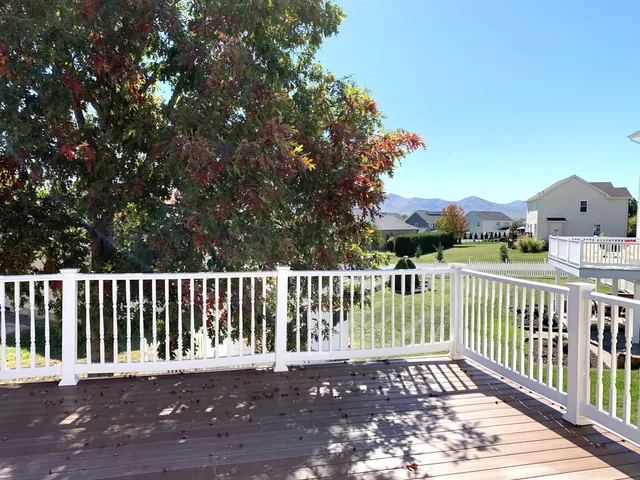 a view of a wooden roof deck