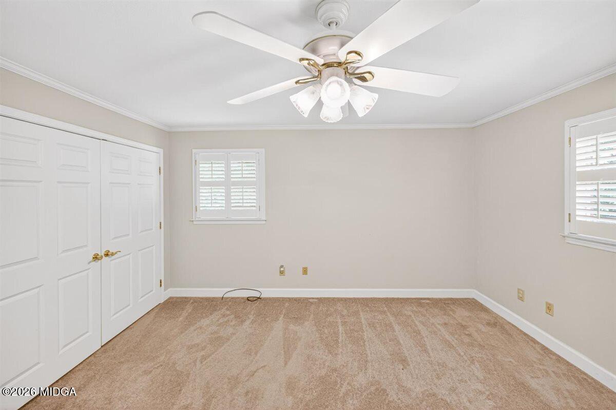 335 Hamrick Road Macon, GA 31220 - Photo 19 of 41 an empty room with windows and fan