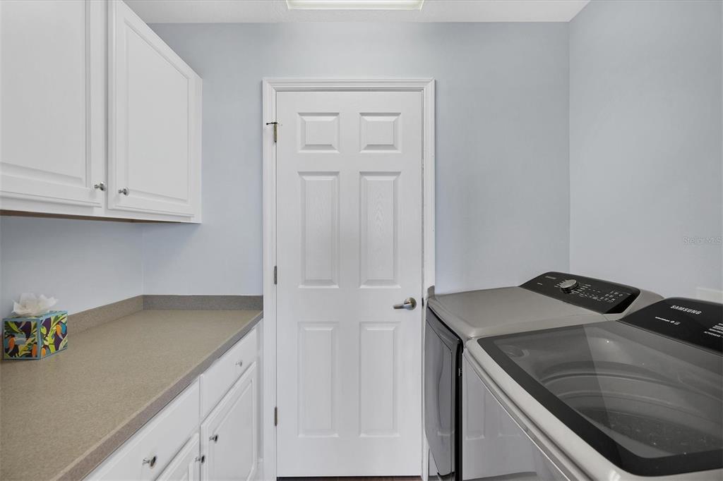 13113 Gasparilla Road, Unit 503 Placida, FL 33946 - Photo 12 of 18 a utility room with dryer and washer